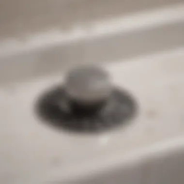 Clogged Bathtub Drain Close-up of a clogged bathtub drain with hair buildup