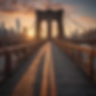 A picturesque view of Brooklyn Bridge with a sunset backdrop, connecting two boroughs.