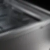 Close-up view of brushed stainless steel appliance reflecting light