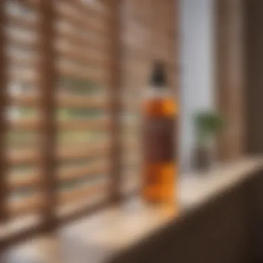 Natural Cleaning Solution for Wooden Blinds A natural cleaning solution in a spray bottle next to wooden blinds