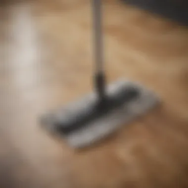 Close-up of a dry mop on Pergo laminate flooring