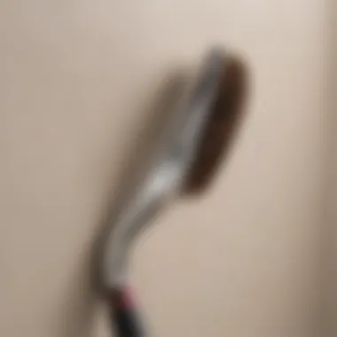 Close-up of a corner being thoroughly cleaned with a brush