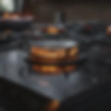 A sparkling black stove top after cleaning