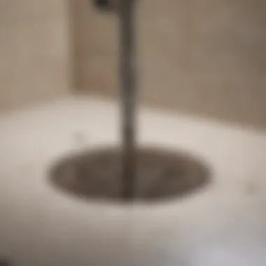 A close-up of Drano pouring into a shower drain, showcasing the product in action.