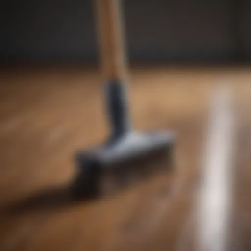 Wood laminate floor cleaning brush in action