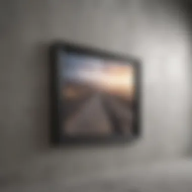 Gallery wall arrangement on concrete surface