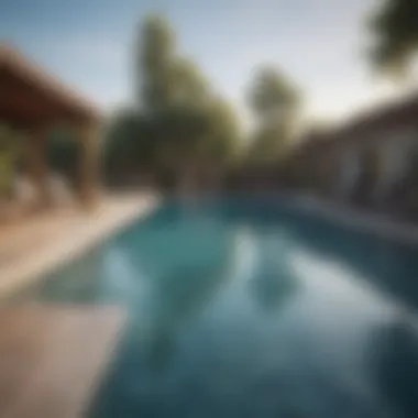 Tranquil Outdoor Pool Area at Oakwood Apartments