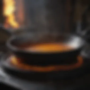 Cast iron pan being seasoned with oil