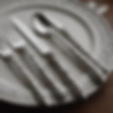 Opulent Silver Cutlery Set Luxurious silver cutlery set with ornate detailing
