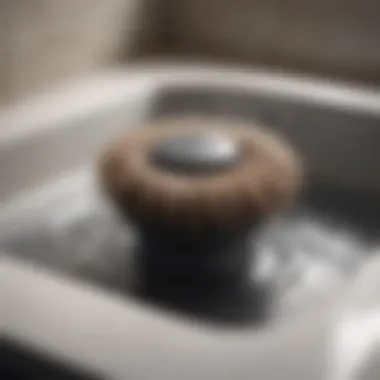 Close-up of hair clog inside a bathroom drain