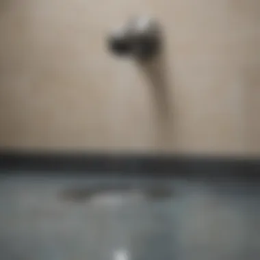 Pristine Water Flow in Unclogged Shower Drain Crystal-clear Water Flowing Through a Shower Drain