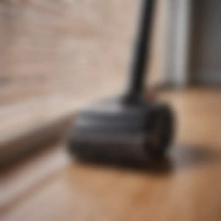 Close-up of blinds being vacuumed with a brush attachment