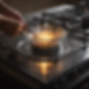 Glass stove burner being scrubbed with a gentle brush